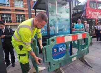 Protective barriers installed to safeguard Banksy’s latest police box masterpiece news-12082024-014730